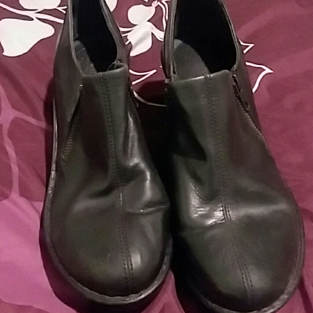 Leather ankle high heels